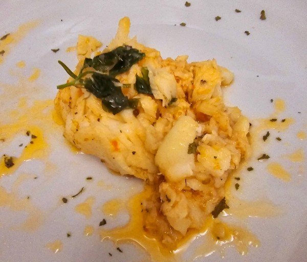 Flaky baked fish with herbs