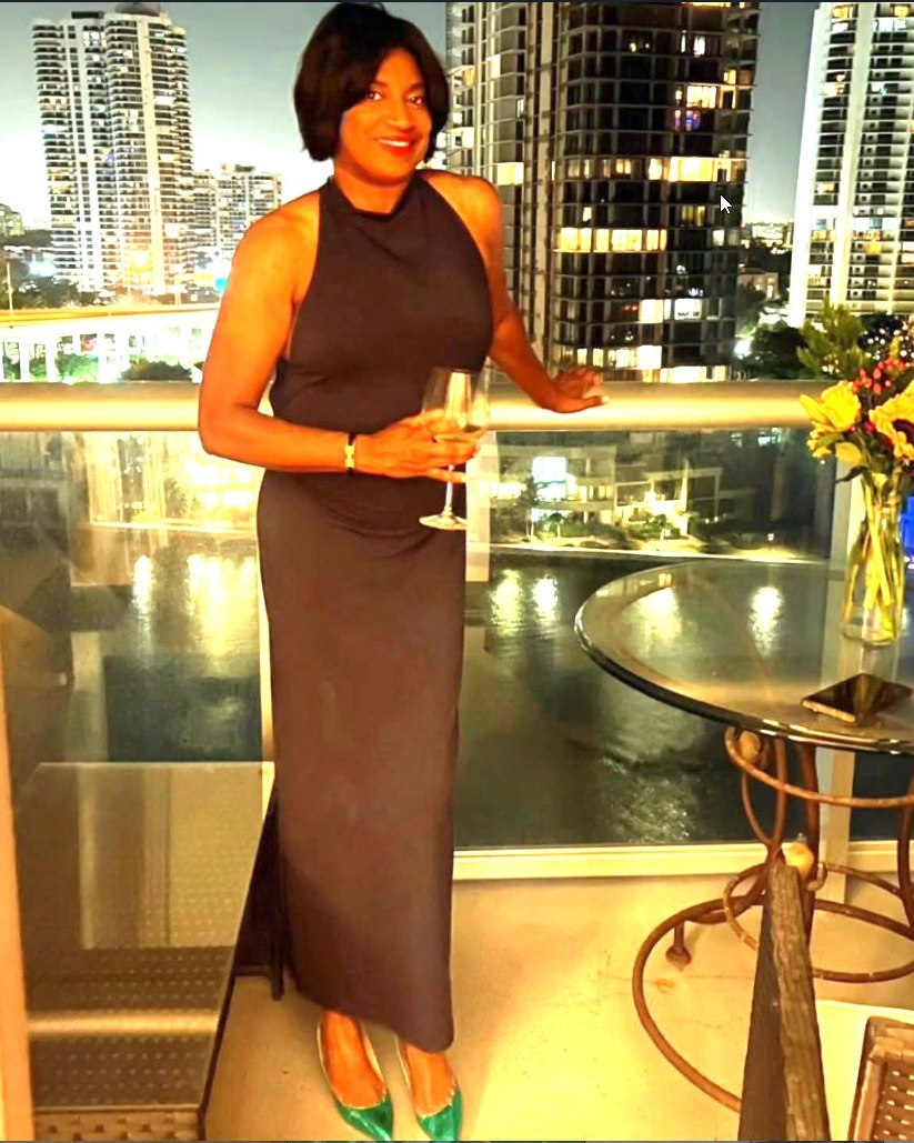 Chef Sendy at an evening event overlooking the Miami skyline